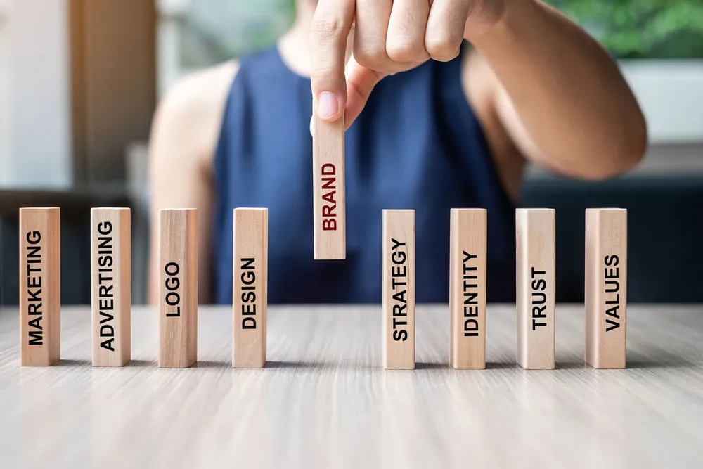 Brand identity is the representation and presentation that a company projects to its audience and customers. It's the way it wants to be remembered and identified. We can divide it into two main groups: visual components and conceptual components.